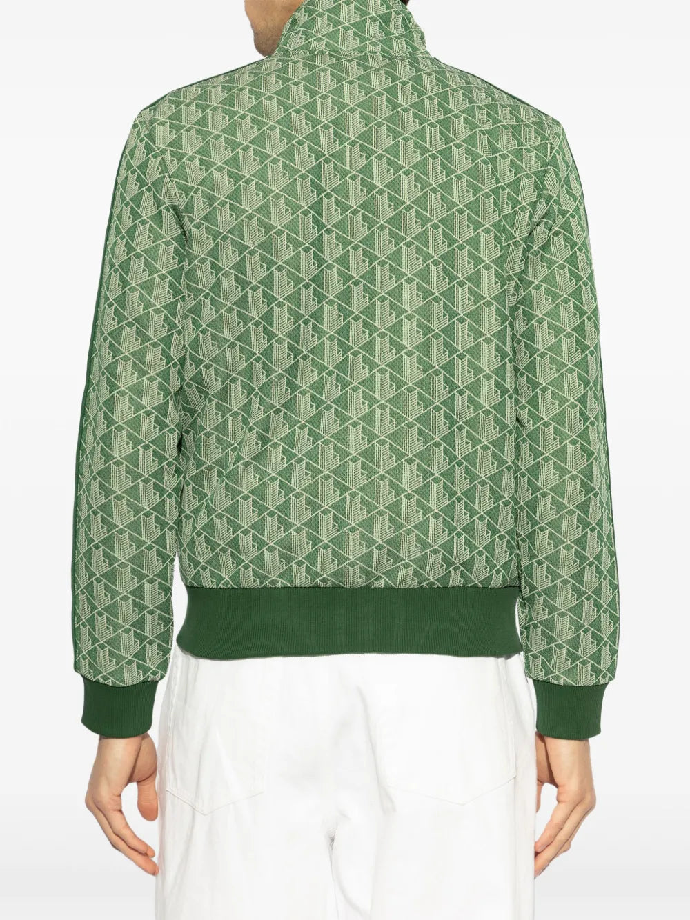 Casaco verde com padronagem monogramada