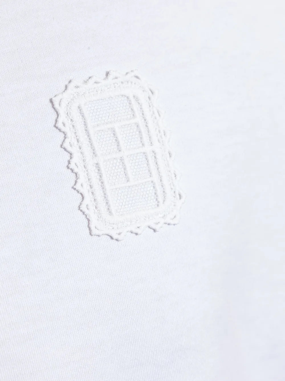 Camisa com aplicação de patch