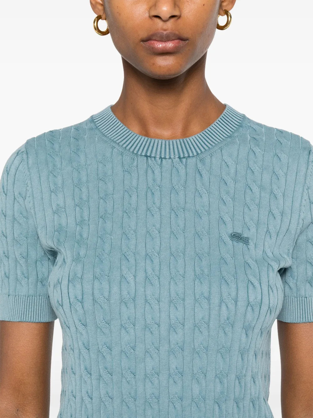 suéter de malha trançada