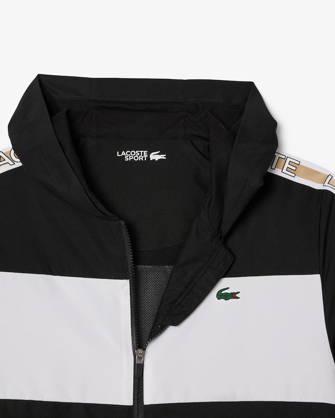 Casaco castanho e branco desportivo com logo