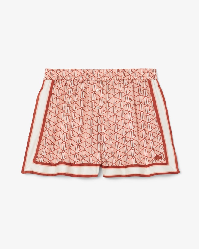 Shorts fluidos com estampa de monograma