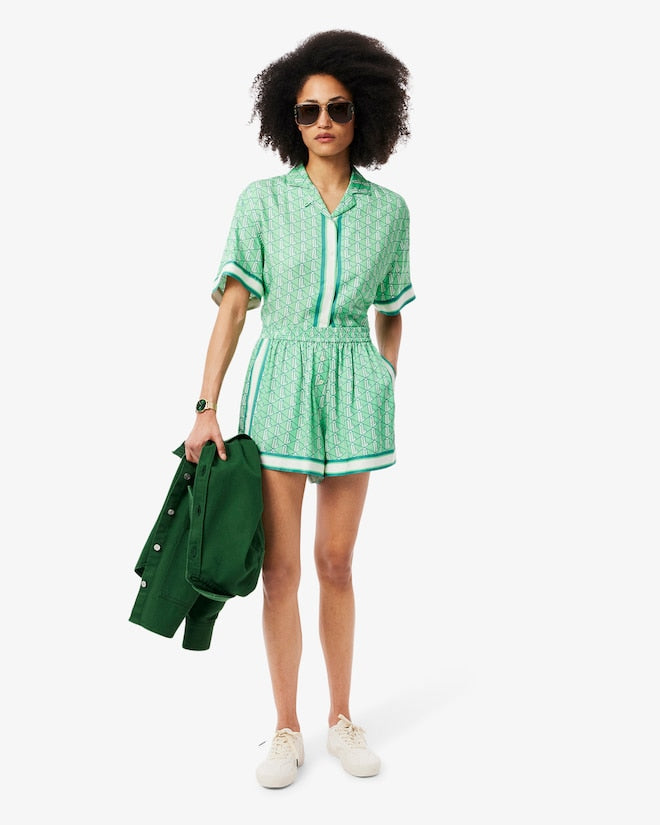 Shorts fluidos com estampa de monograma