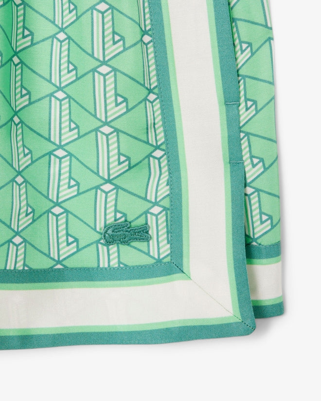 Shorts fluidos com estampa de monograma