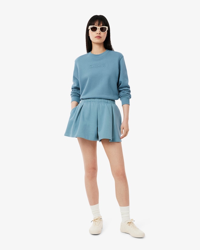 Shorts de pelúcia plissados