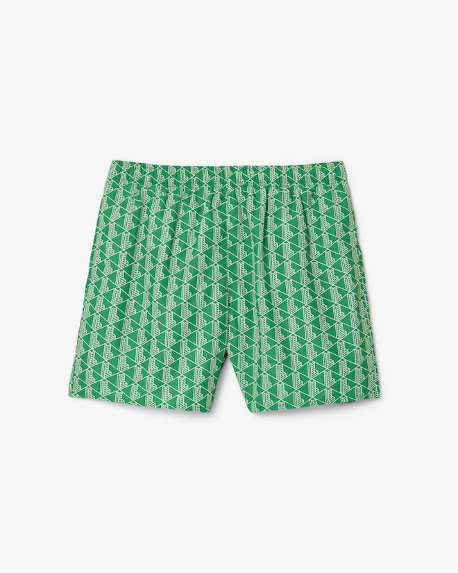 Shorts de banho de comprimento médio com estampa de monograma