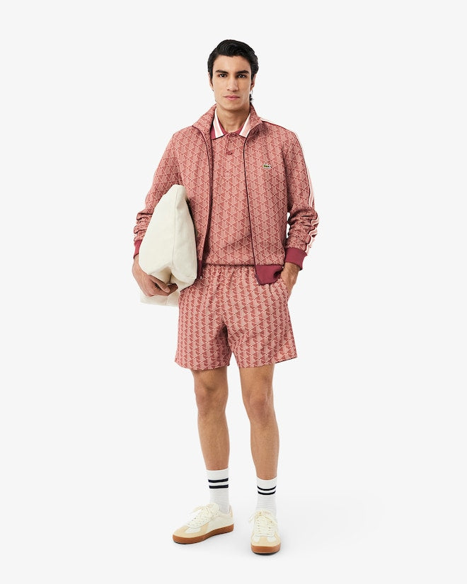 Shorts de banho de comprimento médio com estampa de monograma