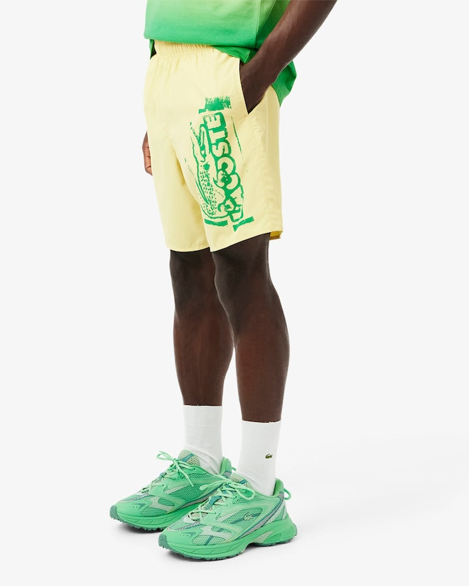 Shorts de banho longos com detalhes da marca