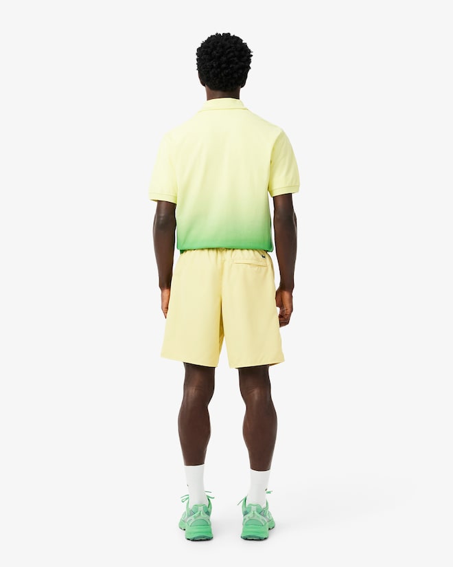 Shorts de banho longos com detalhes da marca