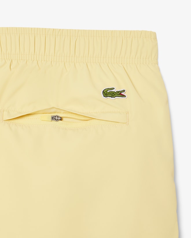 Shorts de banho longos com detalhes da marca