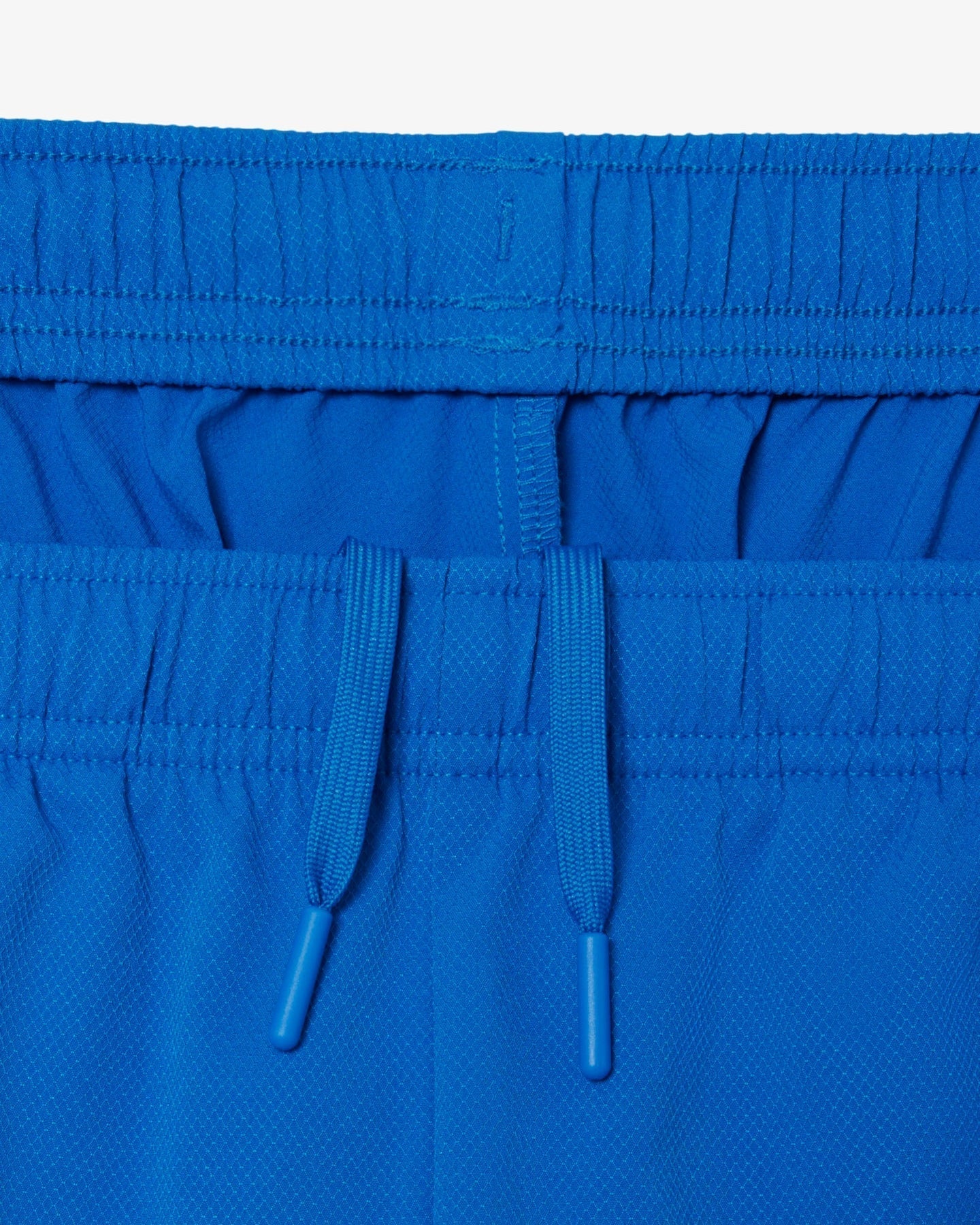 Conjunto verde e azul com logo