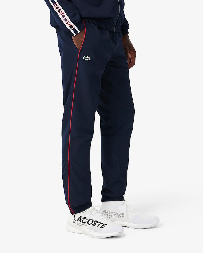 Casaco Desportivo azul escuro com detalhe vermelho com logo