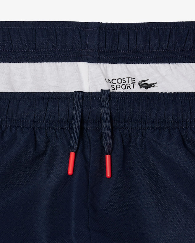 Casaco Desportivo azul escuro com detalhe vermelho com logo