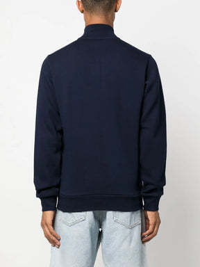 Casaco azul escuro gola alta com fechamento por zíper