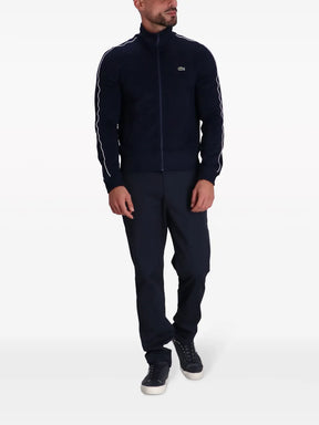 Casaco azul escuro com aplicação de logo