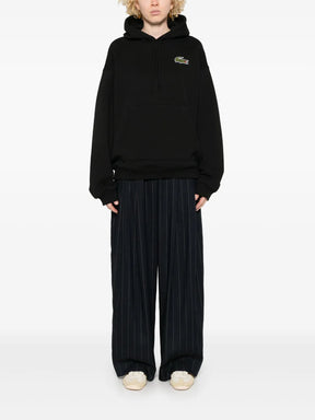 Casaco preto com patch de crocodilo