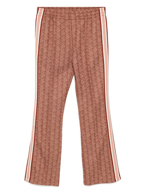 calças boca de sino com estampa de monograma