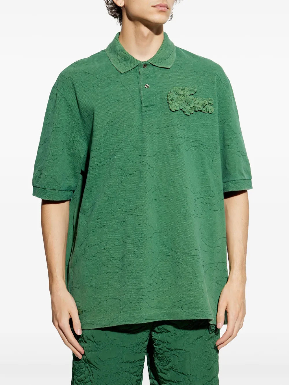 Camisa polo verde com aplicação de crocodilo