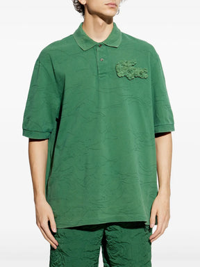 Camisa polo verde com aplicação de crocodilo