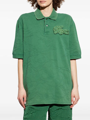 Camisa polo verde com aplicação de crocodilo