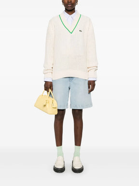 suéter com remendo de logotipo