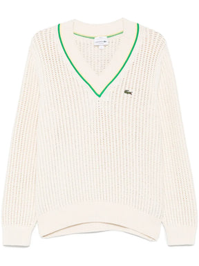 suéter com remendo de logotipo