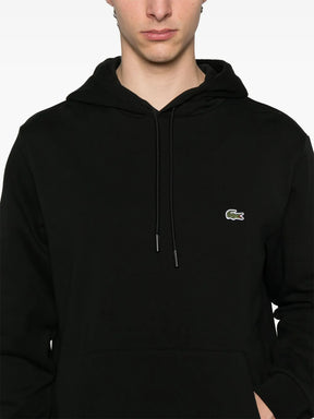 Casaco preto com capuz e patch de logo