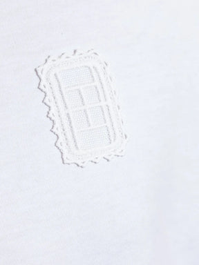 Camisa com aplicação de patch