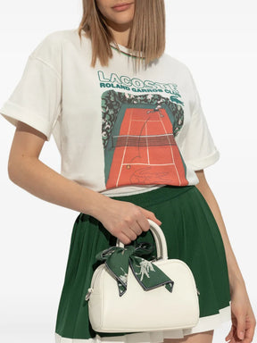 bolsa de couro com detalhe de cachecol