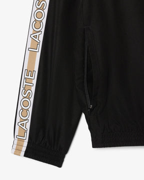 Casaco castanho e branco desportivo com logo