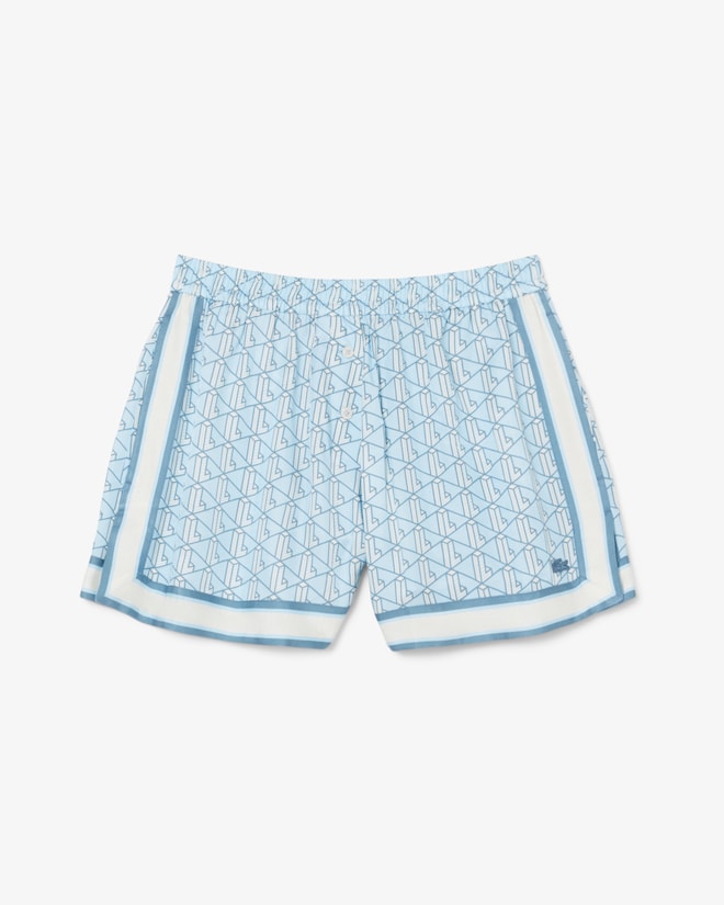 Shorts fluidos com estampa de monograma