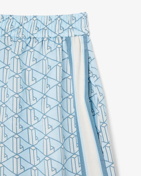 Shorts fluidos com estampa de monograma