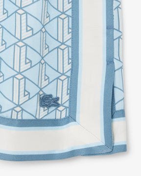 Shorts fluidos com estampa de monograma