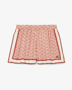 Shorts fluidos com estampa de monograma