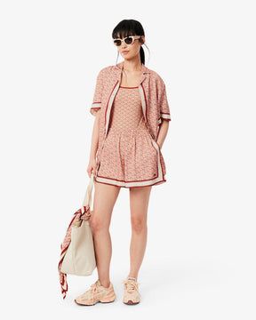 Shorts fluidos com estampa de monograma