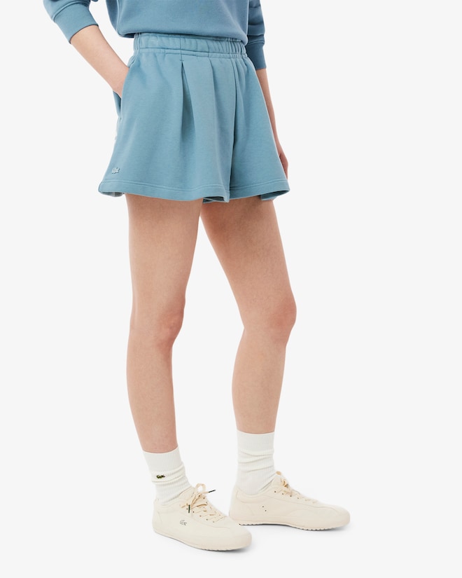 Shorts de pelúcia plissados