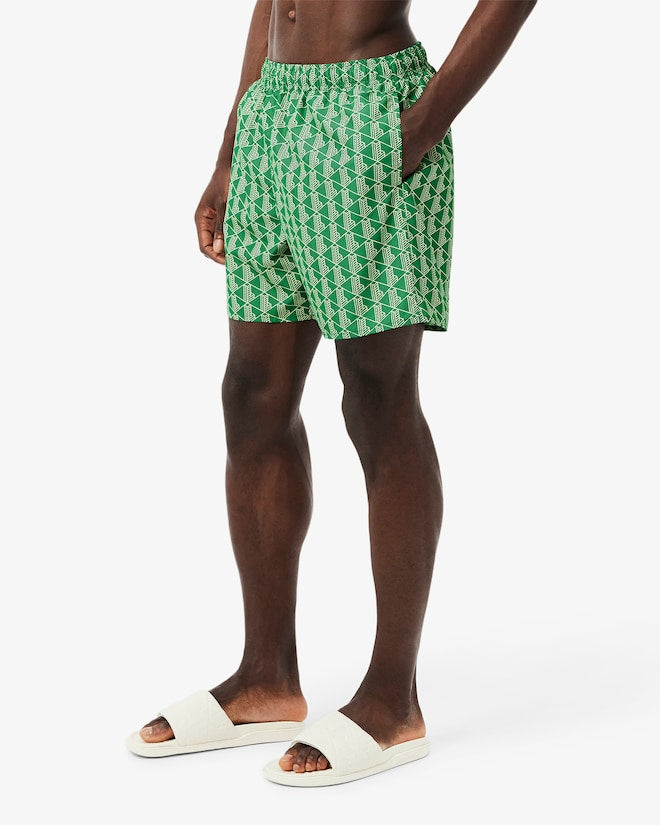 Shorts de banho de comprimento médio com estampa de monograma