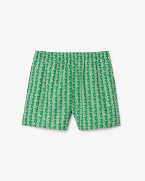 Shorts de banho de comprimento médio com estampa de monograma