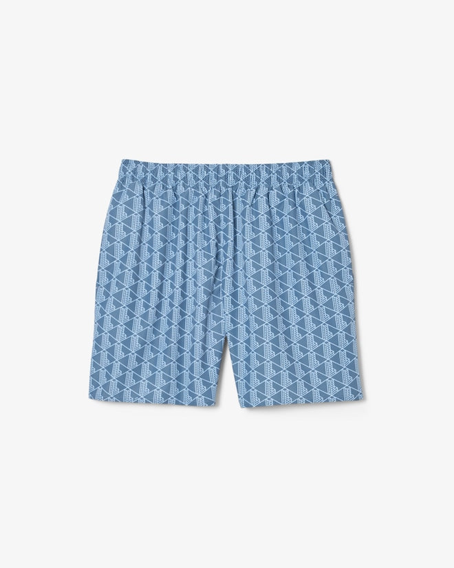Shorts de banho de comprimento médio com estampa de monograma