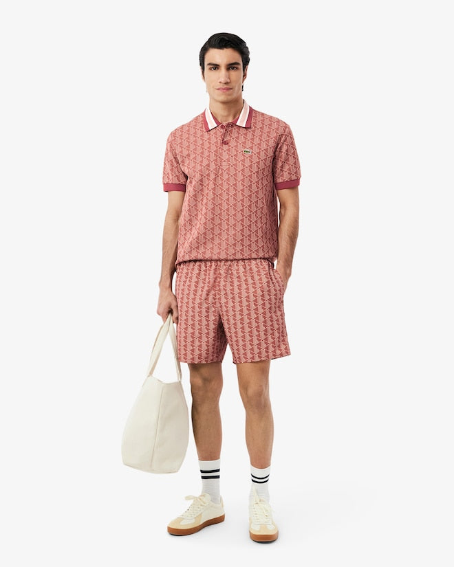 Shorts de banho de comprimento médio com estampa de monograma