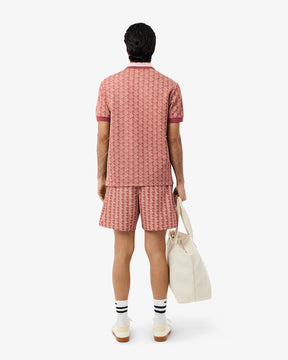 Shorts de banho de comprimento médio com estampa de monograma