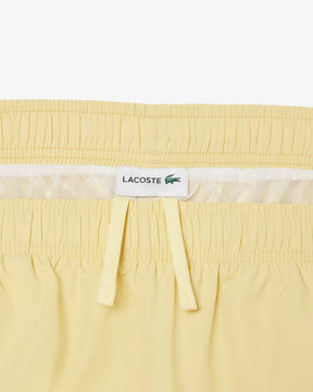 Shorts de banho longos com detalhes da marca
