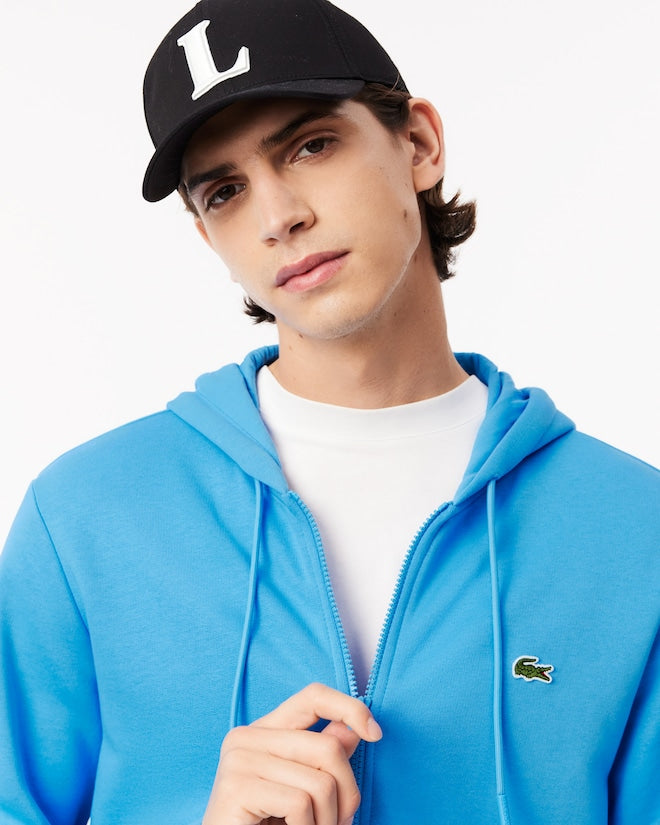 Casaco com capuz e zíper