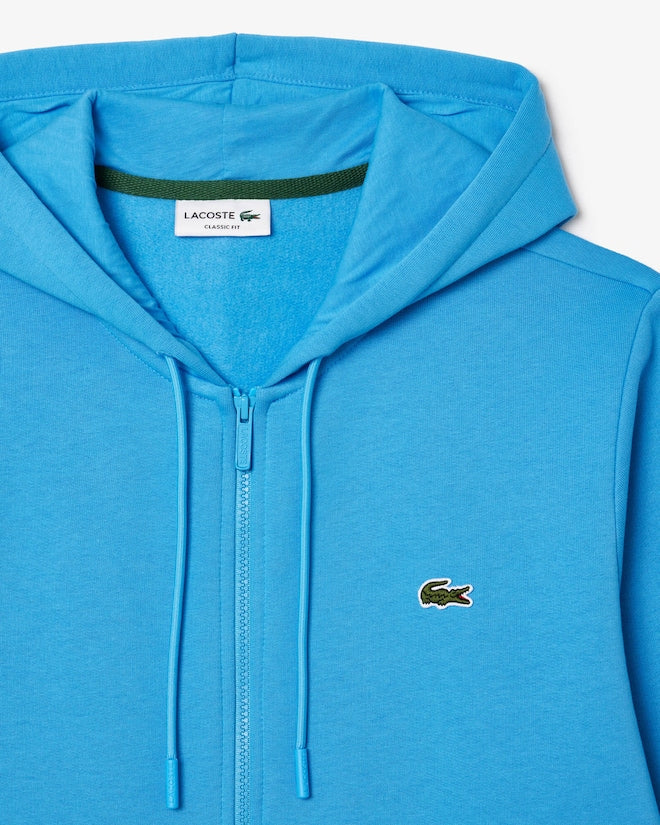 Casaco com capuz e zíper