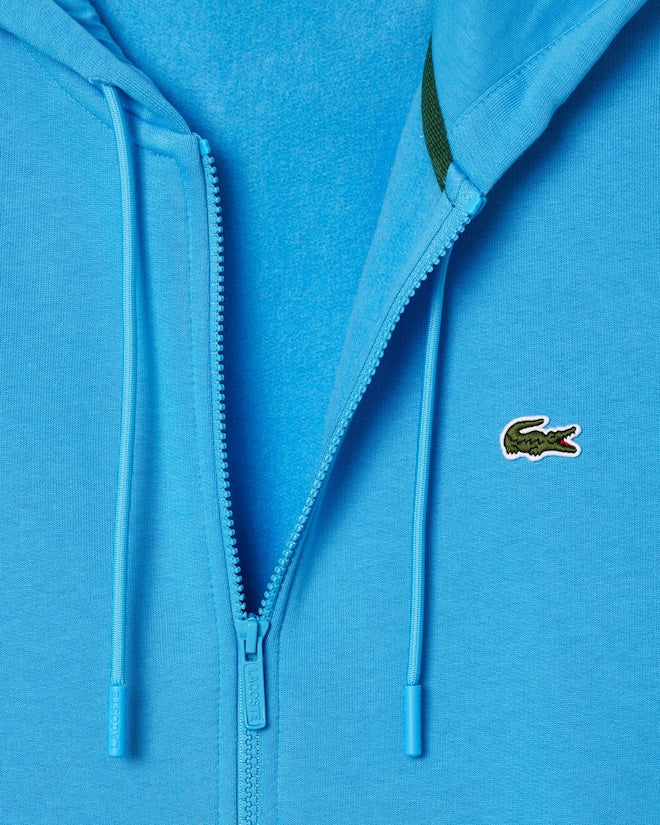 Casaco com capuz e zíper