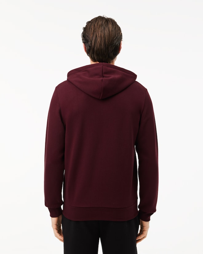 Casaco com capuz e zíper