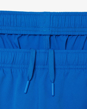 Conjunto verde e azul com logo