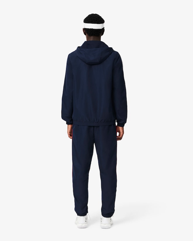 Casaco Desportivo azul escuro com detalhe vermelho com logo