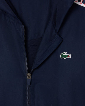 Casaco Desportivo azul escuro com detalhe vermelho com logo