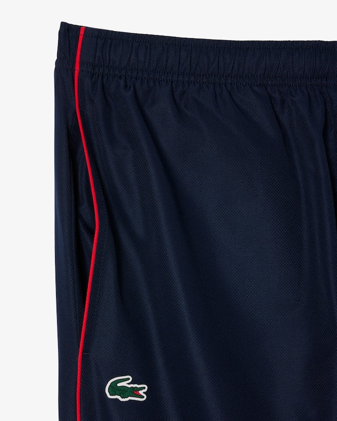 Casaco Desportivo azul escuro com detalhe vermelho com logo