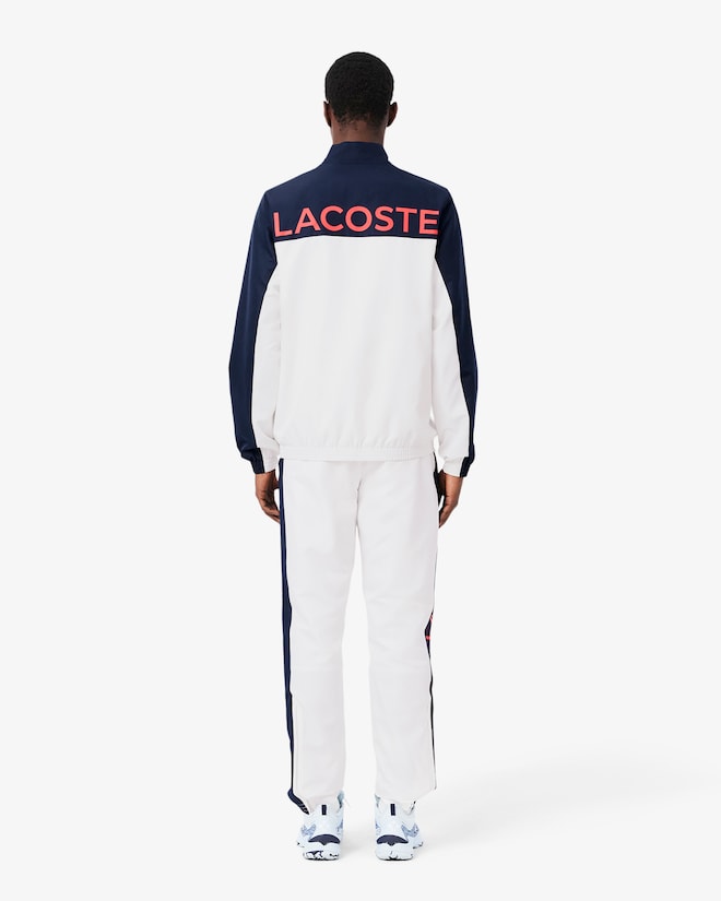 Conjunto branco e azul com logo